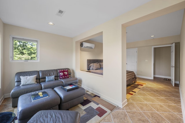 living room with light tile patterned floors and a wall mounted AC