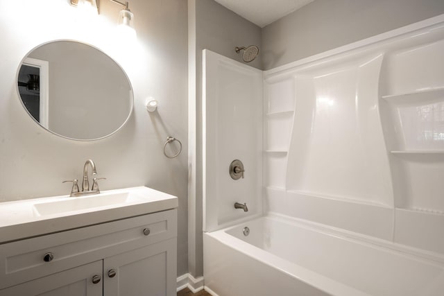 bathroom featuring vanity and tub / shower combination