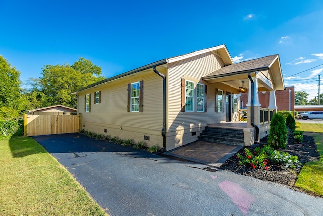 14 N Parkdale Ave, Chattanooga, TN 37411 - view of home's exterior with fence, covered porch, and crawl space