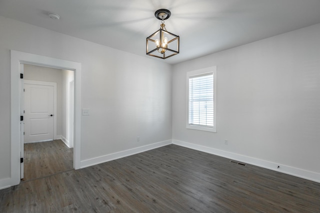 14 N Parkdale Ave, Chattanooga, TN 37411 - spare room with an inviting chandelier, baseboards, dark wood-style floors, and visible vents