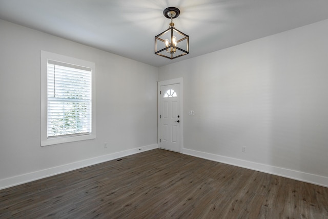 14 N Parkdale Ave, Chattanooga, TN 37411 - foyer with a healthy amount of sunlight, baseboards, dark wood finished floors, and a notable chandelier