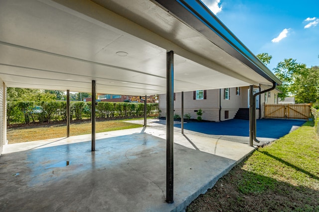 view of pool with a yard