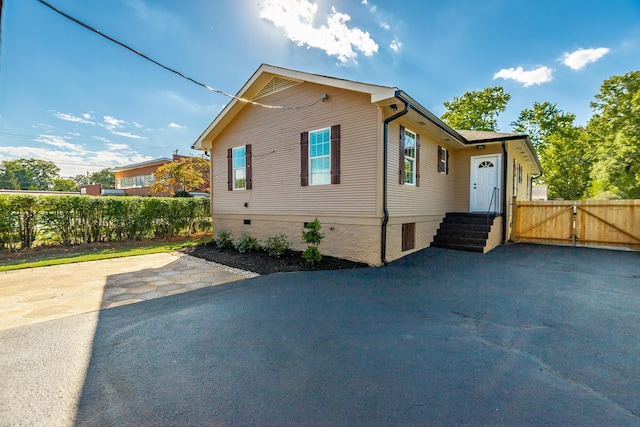 14 N Parkdale Ave, Chattanooga, TN 37411 - view of home's exterior with a patio, fence, and a gate