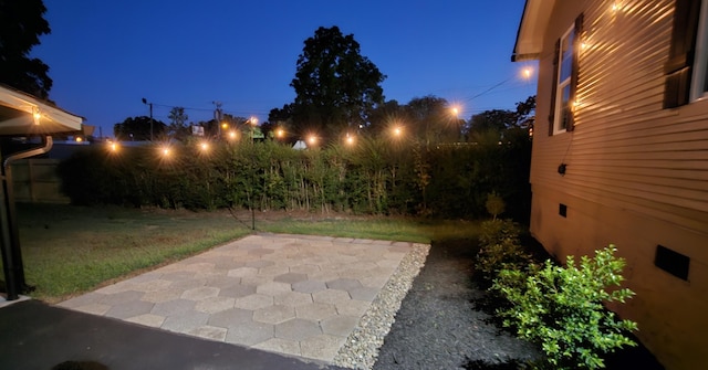 view of patio at twilight