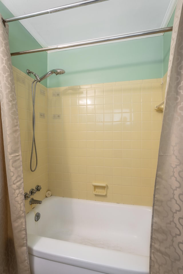 bathroom with shower / bath combo