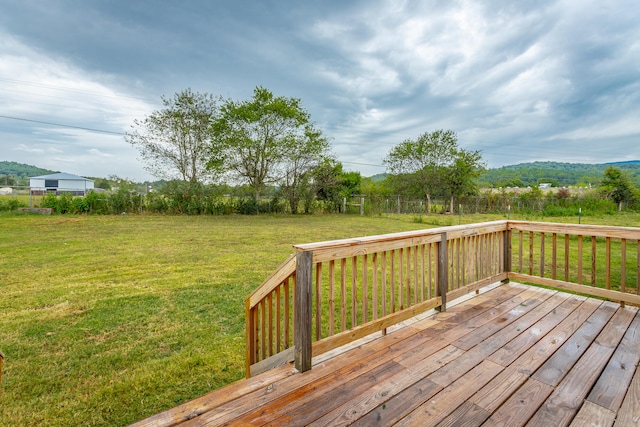 deck featuring a lawn