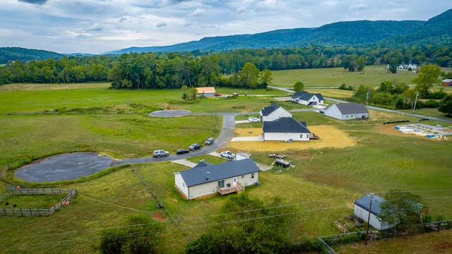 aerial view with a mountain view and a rural view