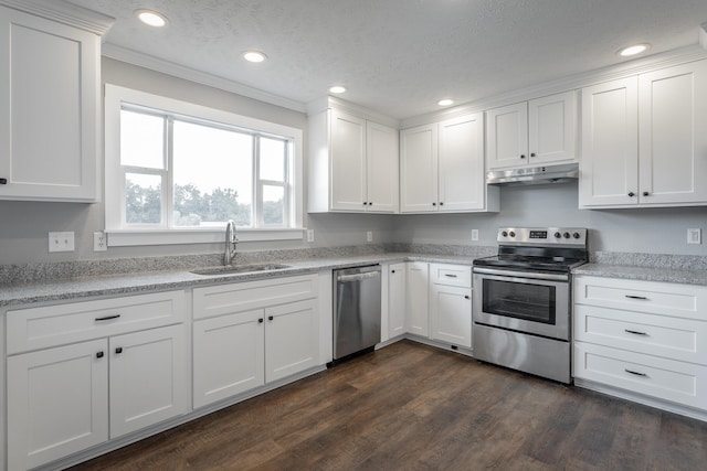 kitchen with dark hardwood / wood-style flooring, stainless steel appliances, crown molding, sink, and white cabinetry