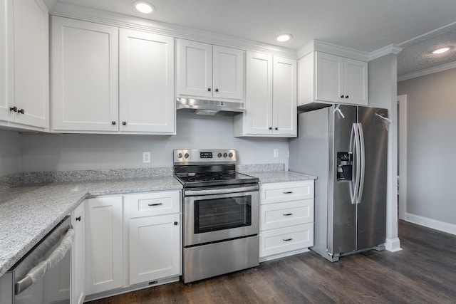 kitchen featuring light stone countertops, ornamental molding, appliances with stainless steel finishes, dark hardwood / wood-style flooring, and white cabinetry