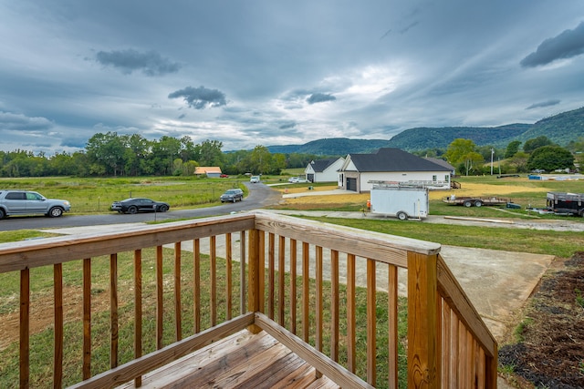 wooden terrace featuring a mountain view