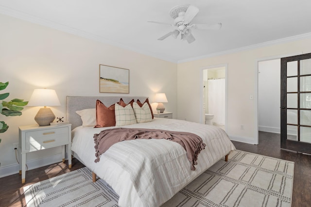 bedroom with ceiling fan, ensuite bath, dark hardwood / wood-style floors, and ornamental molding