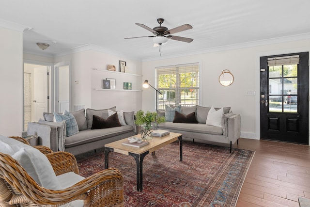 living room featuring crown molding, dark hardwood / wood-style flooring, and ceiling fan