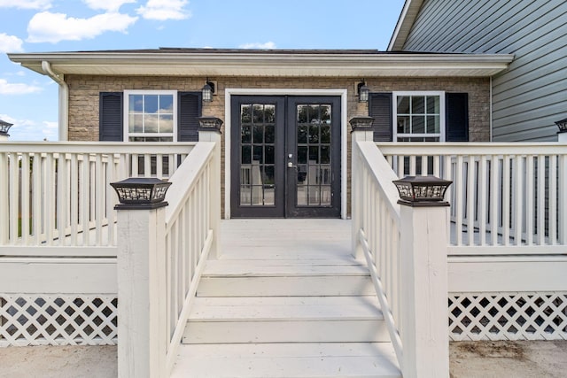 doorway to property featuring french doors