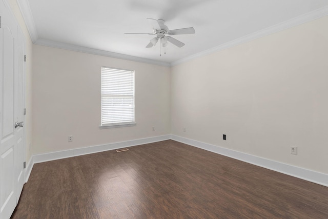 unfurnished room with ornamental molding, ceiling fan, and dark wood-type flooring