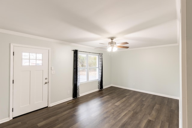 entrance foyer with dark wood finished floors, ceiling fan, baseboards, and ornamental molding