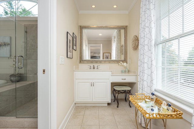 bathroom featuring vanity, tile patterned floors, a shower with shower door, and crown molding