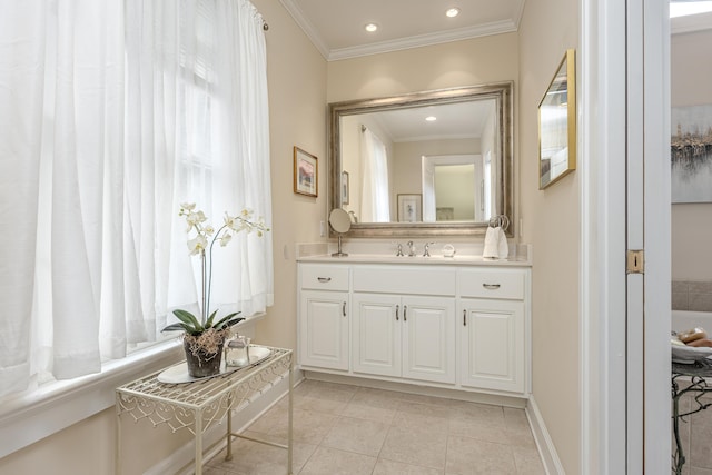 bathroom with vanity, crown molding, and tile patterned floors