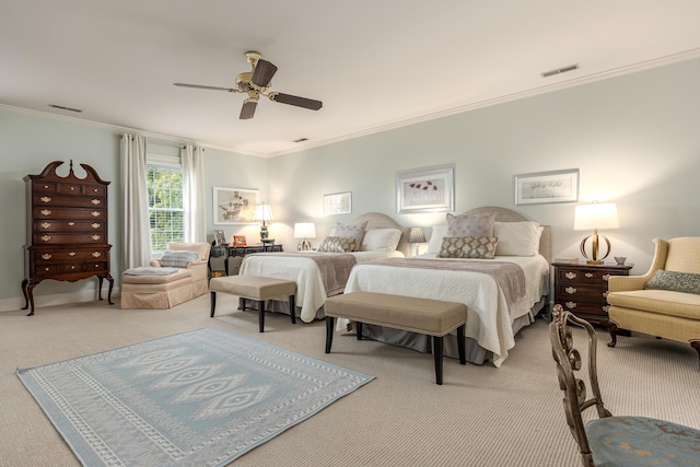 bedroom with ceiling fan, crown molding, and light carpet