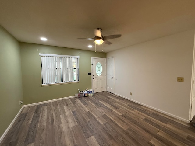 foyer entrance featuring dark hardwood / wood-style flooring and ceiling fan