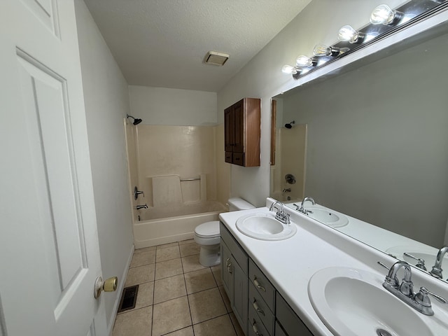 full bathroom with tile patterned floors, a sink, and toilet
