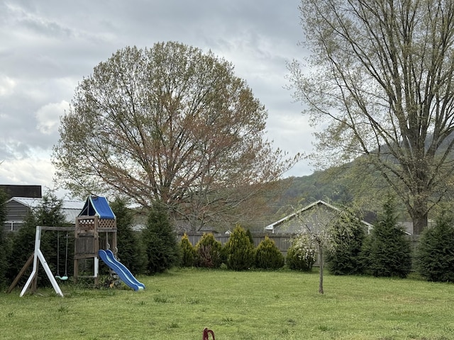 view of yard featuring a playground