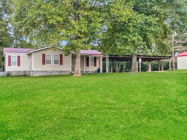 view of front facade with a pergola and a front lawn