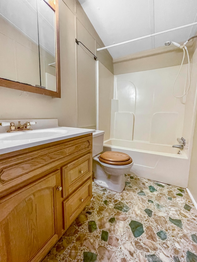 full bathroom with shower / bath combination, vanity, and toilet