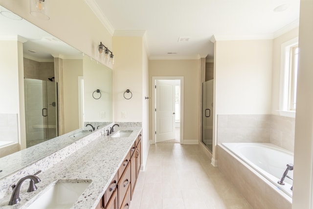 bathroom with vanity, crown molding, shower with separate bathtub, and a healthy amount of sunlight