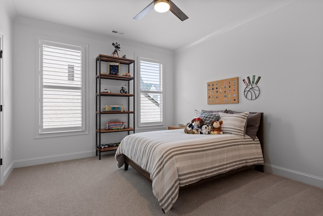 carpeted bedroom with ceiling fan