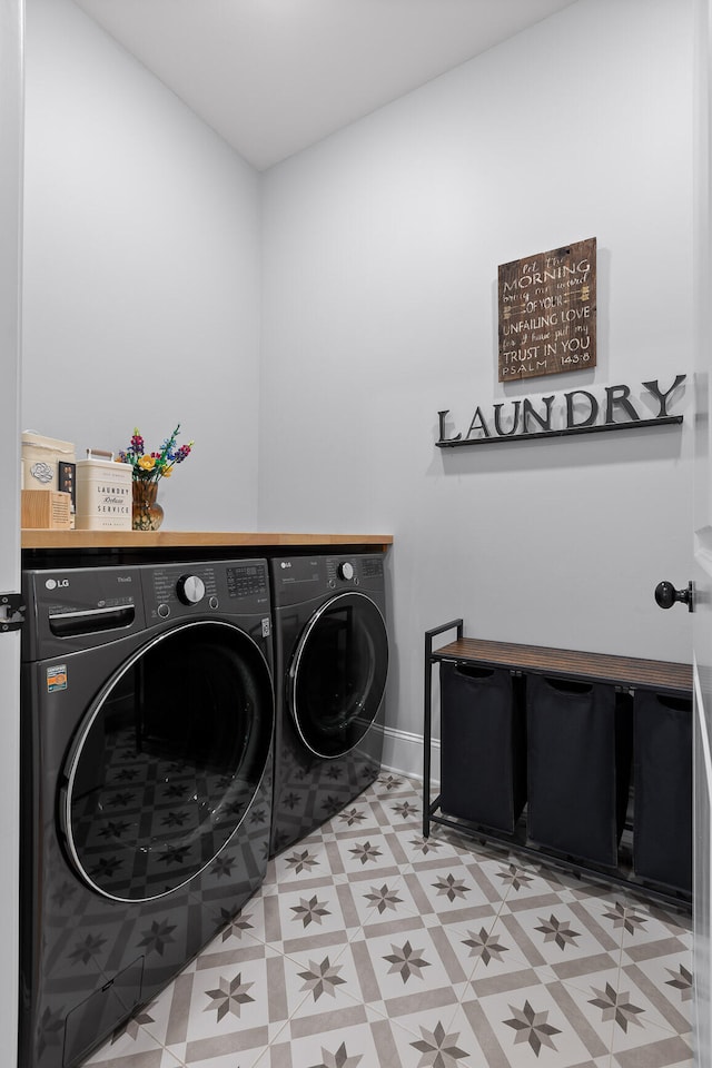 laundry room with washer and dryer