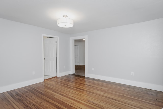 empty room featuring hardwood / wood-style floors