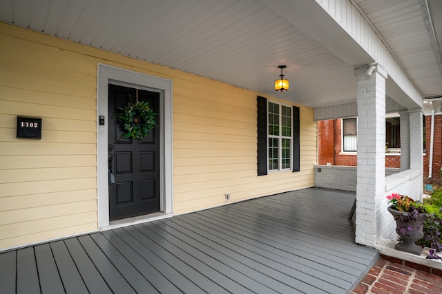 wooden deck featuring a porch