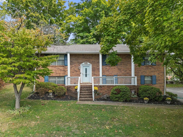 26 Copper Ln, Rossville, GA 30741 - bi-level home featuring a front lawn, brick siding, and covered porch