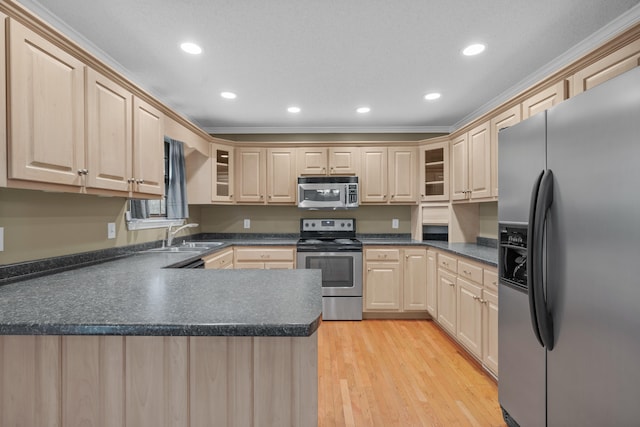 kitchen with light brown cabinets, sink, stainless steel appliances, crown molding, and light hardwood / wood-style floors