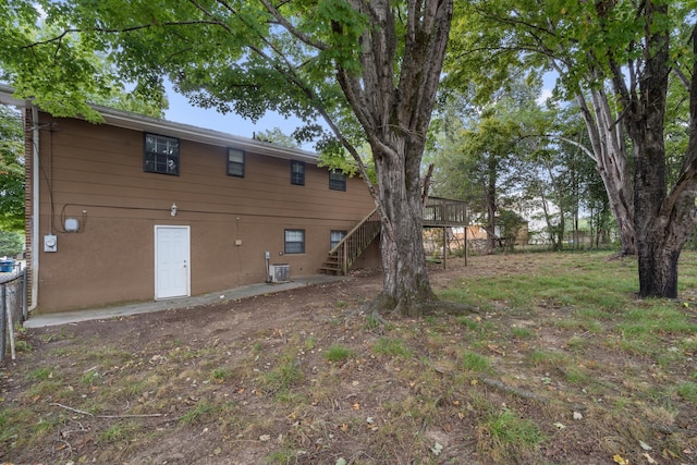 26 Copper Ln, Rossville, GA 30741 - rear view of property featuring stairway, a wooden deck, and fence