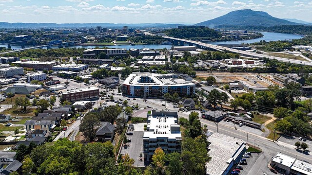 bird's eye view with a water and mountain view