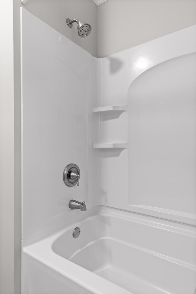 bathroom with shower / tub combination