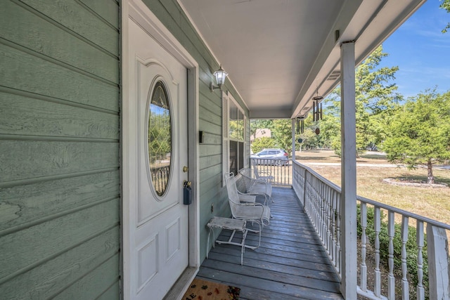 wooden terrace with covered porch