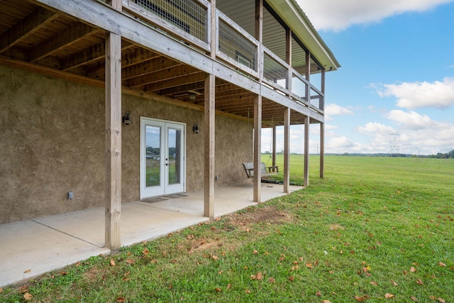 view of yard featuring a patio area and a rural view