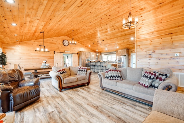 living room with wood ceiling, wooden walls, a chandelier, high vaulted ceiling, and light hardwood / wood-style floors