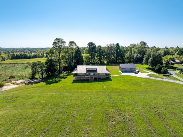 birds eye view of property featuring a rural view