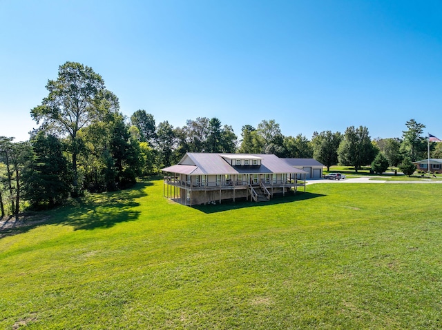 view of yard featuring a wooden deck