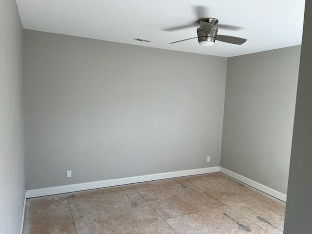 empty room featuring ceiling fan