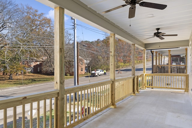 unfurnished sunroom with ceiling fan and a healthy amount of sunlight