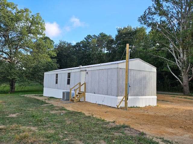 view of outbuilding with central AC unit