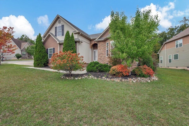 view of front of home with a front lawn