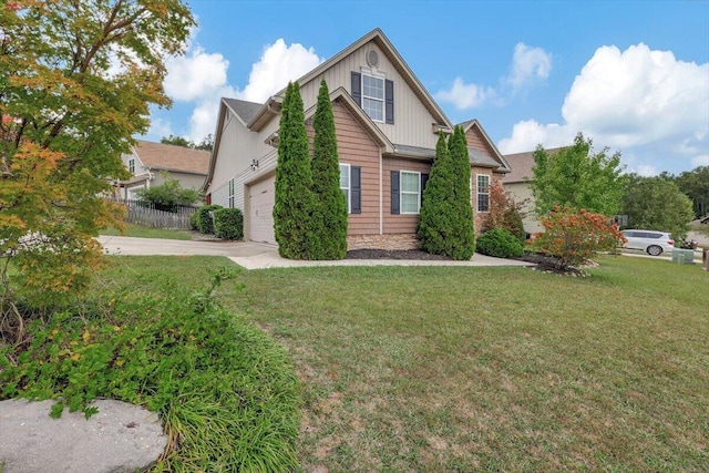 view of front facade featuring a front lawn and a garage