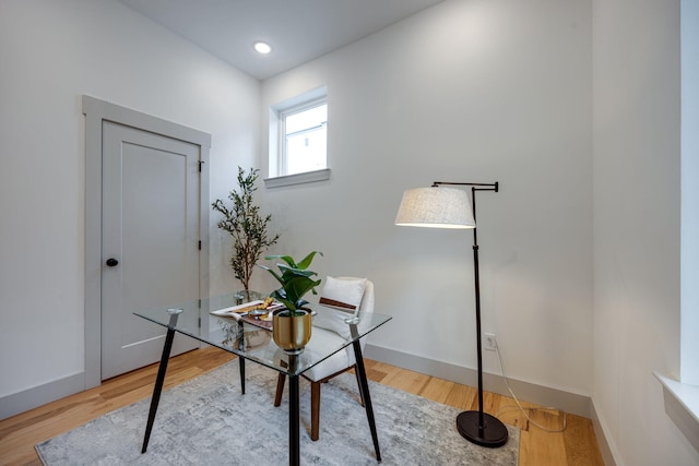 office featuring wood finished floors and baseboards