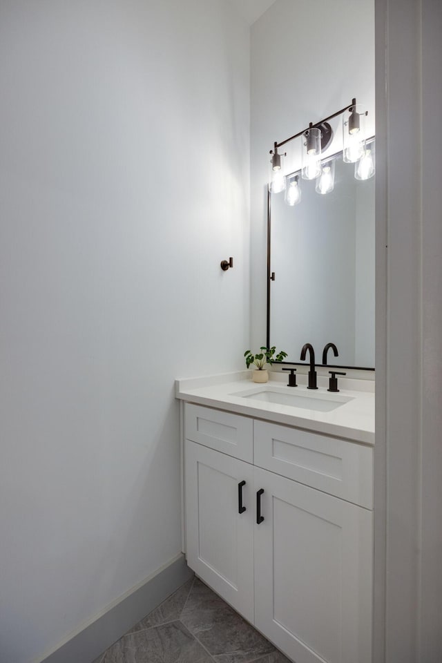724 W Bell Ave # 110, Chattanooga, TN 37405 - bathroom with baseboards, tile patterned flooring, and vanity