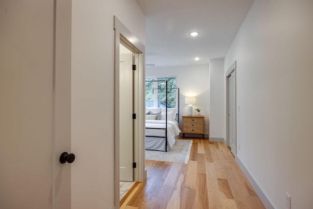 724 W Bell Ave # 110, Chattanooga, TN 37405 - hallway with baseboards, recessed lighting, and light wood-style floors